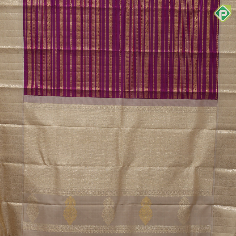Purple base gold zari multi designed butta lines creamy sandal gold zari double peacock butta border bridal silk saree