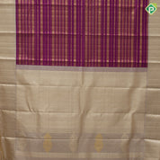 Purple base gold zari multi designed butta lines creamy sandal gold zari double peacock butta border bridal silk saree