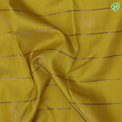 Lemon yellow gold zari Gomadha and zari lines self gold zari and purple edge border traditional silk saree