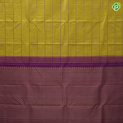 Lemon yellow gold zari Gomadha and zari lines self gold zari and purple edge border traditional silk saree