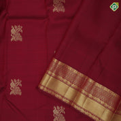 Maroon gold zari peacock on branch butta self multi classic symbol butta lines border traditional silk saree