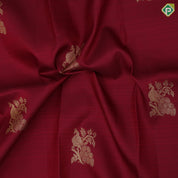 Maroon gold zari peacock on branch butta self multi classic symbol butta lines border traditional silk saree