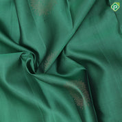 Teel green copper zari fancy flower butta contrast blue copper zari flower border pure mix soft silk saree