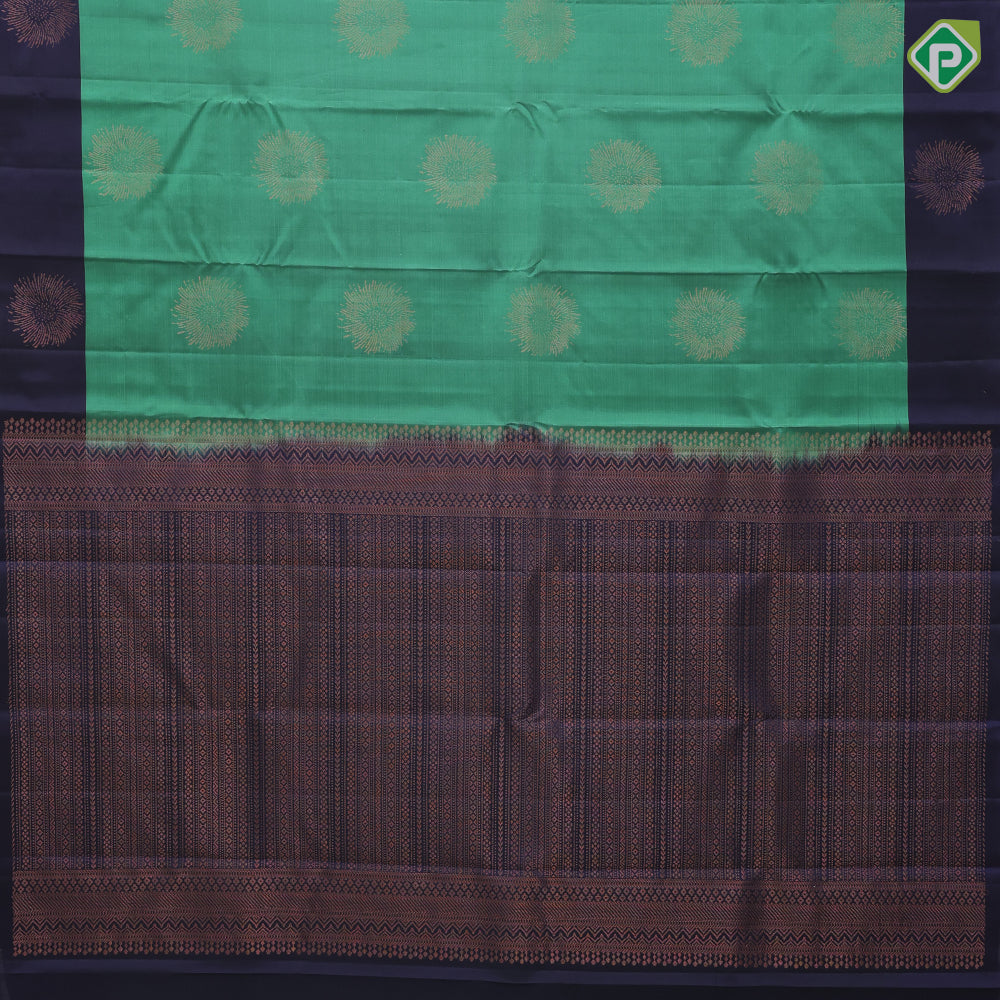 Teel green copper zari fancy flower butta contrast blue copper zari flower border pure mix soft silk saree