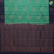 Teel green copper zari fancy flower butta contrast blue copper zari flower border pure mix soft silk saree