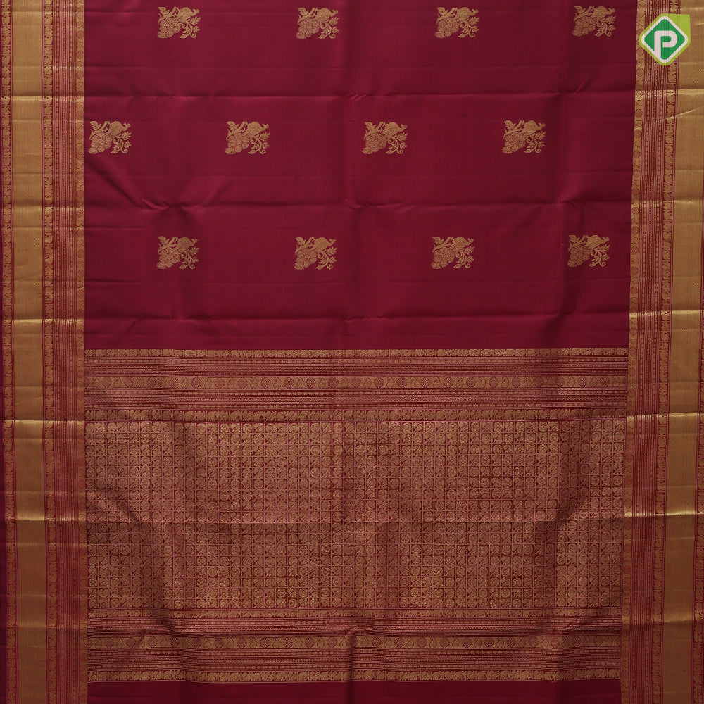 Maroon gold zari peacock on branch butta self multi classic symbol butta lines border traditional silk saree