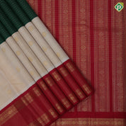 Sandal Wood Gold Zari Chakaram Peacock Bottle Green Checks Design Chilly Red Ruthracham Peacock Border Design Traditional Silk Saree
