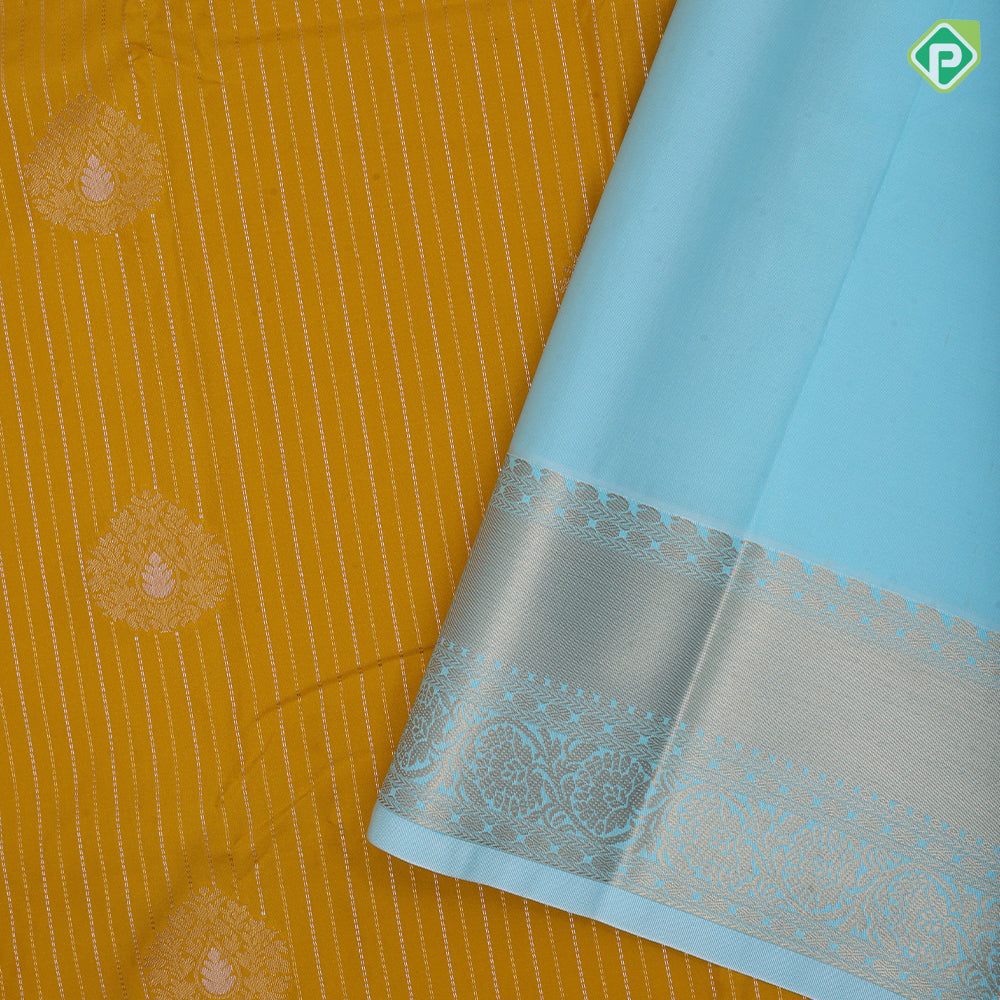 Mustard yellow gold zari stripes big thilagam butta pista green gold zari rangoli design border art silk saree