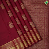 Maroon gold zari peacock on branch butta self multi classic symbol butta lines border traditional silk saree