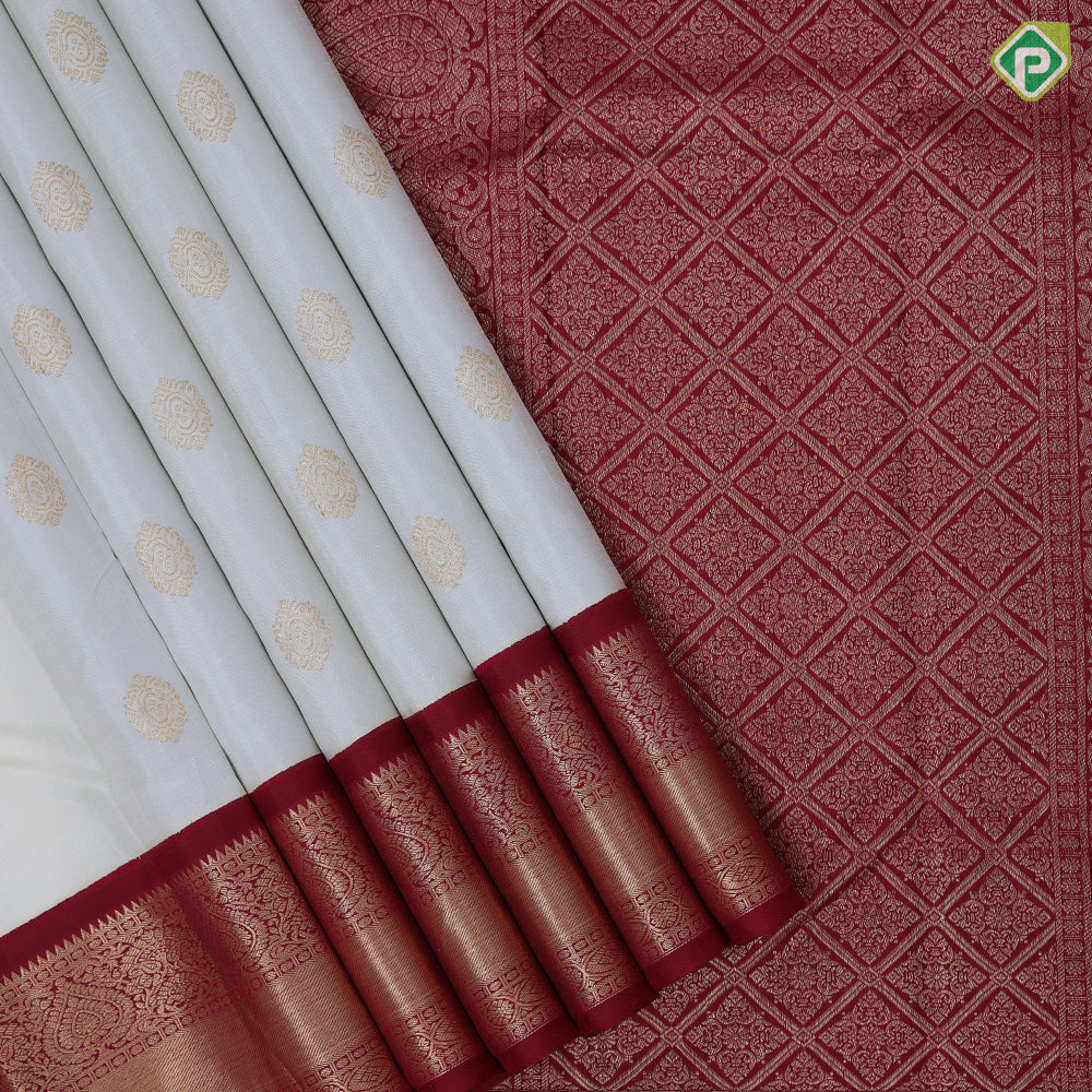Milk white gold zari over round butta design maroon with gold zari thilagam design border traditional retro silk saree