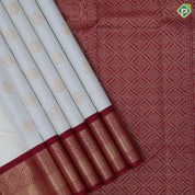 Milk white gold zari over round butta design maroon with gold zari thilagam design border traditional retro silk saree