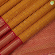 Mustard yellow silk checks star butta motifs design rani pink gold zari border traditional silk saree
