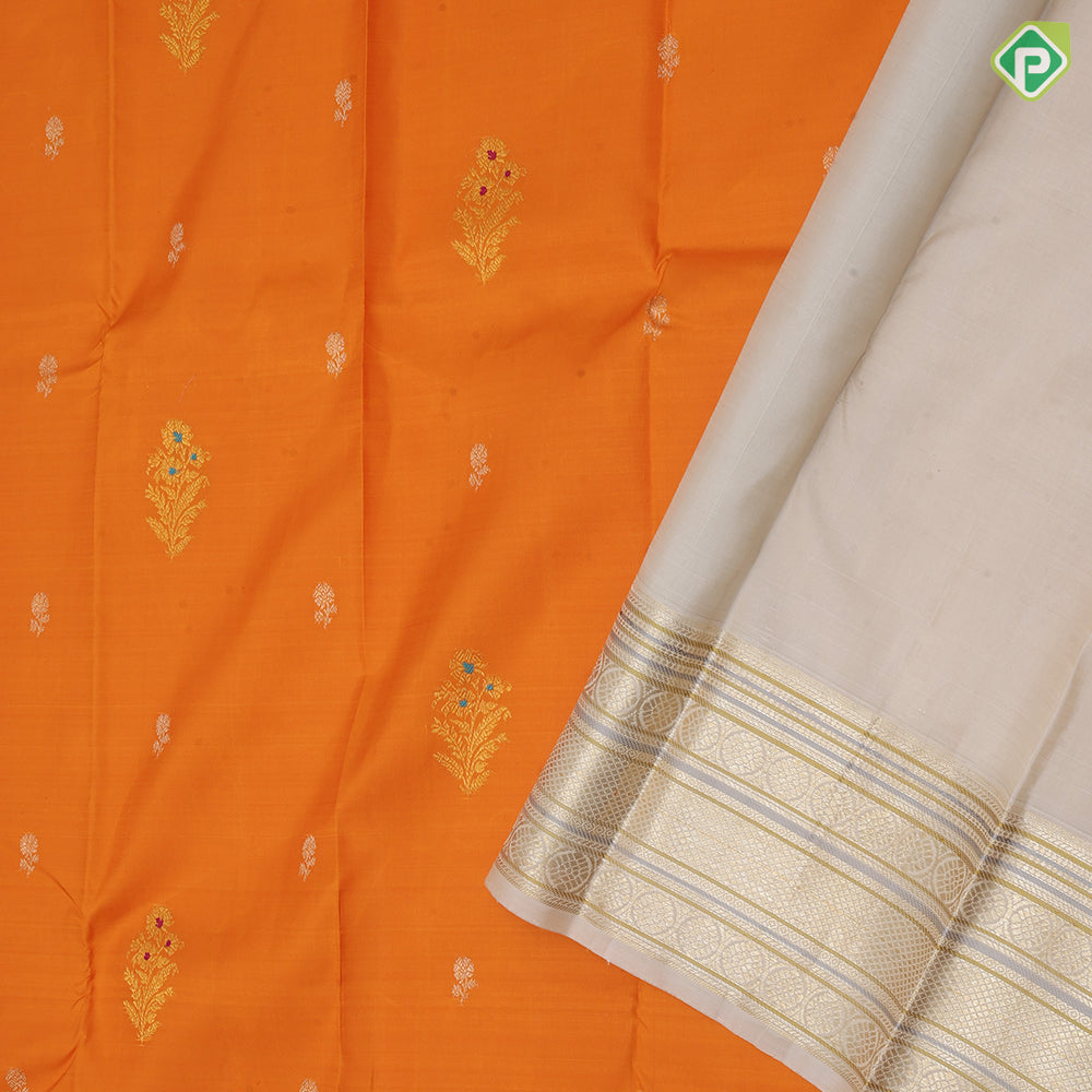 Fanta orange gold zari meena work flower bunch butta creamy sandal silver gold zari meena work border traditional silk saree