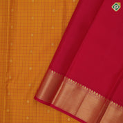 Mustard yellow silk checks star butta motifs design rani pink gold zari border traditional silk saree