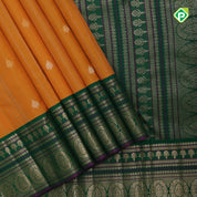 Mango yellow dull gold zari lines and butta design contrast green silver gold zari butta border traditional silk saree