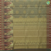Mint green gold zari kattam checked round butta self thamayanthi stading posture art effect painting signature silk saree