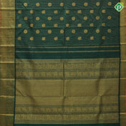 Bottle green gold zari peacock chakkaram butta self gold zari peacock mango butta border traditional silk saree