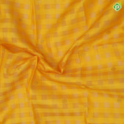 Dual yellow checks and chakkaram butta design rani red gold zari multi lines border kora traditional silk saree