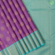 Lavender gold zari thilagam butta design rama green gold zari zig zag border traditional silk saree