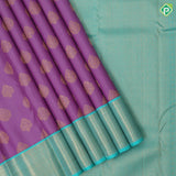 Lavender gold zari thilagam butta design rama green gold zari zig zag border traditional silk saree