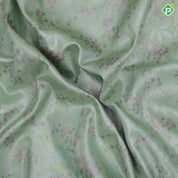 Pista green silver zari and multi color floral design contrast double color center border tissue art silk saree