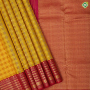 Dual yellow checks and chakkaram butta design rani red gold zari multi lines border kora traditional silk saree