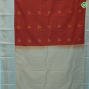 Rust color gold zari stripes and flower creeper butta sea blue gold zari peacock butta border art silk saree