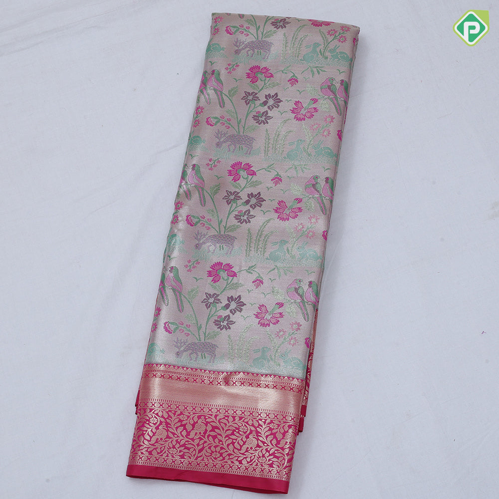 Pewter pink base multi color wild effect design dark green gold zari floral birds design border tissue art silk saree