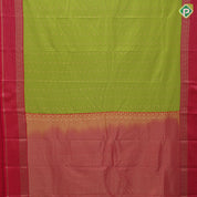 Parrot green gold zari checks and kamalam butta rani pink gold zari border art silk saree