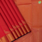 Flame red gold zari kattam checks design parrot butta padded self gold zari bavanji edge border traditional silk saree
