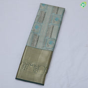 green base pastel red frame flower design self color gold zari grand border tissue art silk saree
