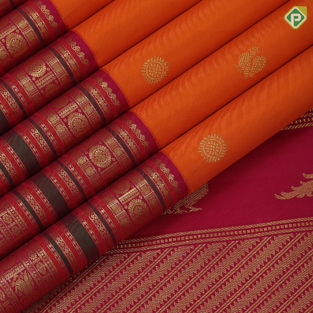 Kaavi orange gold zari Annam chakkaram butta motifs rani red gold zari rudrakkam annam butta lines border vintage silk saree