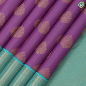 Lavender gold zari thilagam butta design rama green gold zari zig zag border traditional silk saree