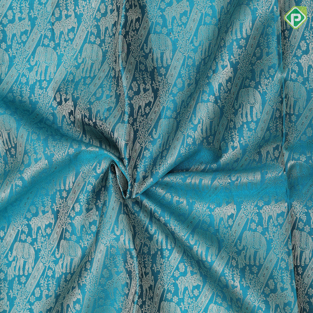 Tiffany Blue silver gold zari fancy elephant design indigo blue gold zari high border pattu paavadai lehanka