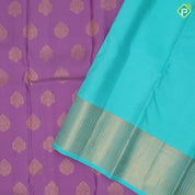 Lavender gold zari thilagam butta design rama green gold zari zig zag border traditional silk saree