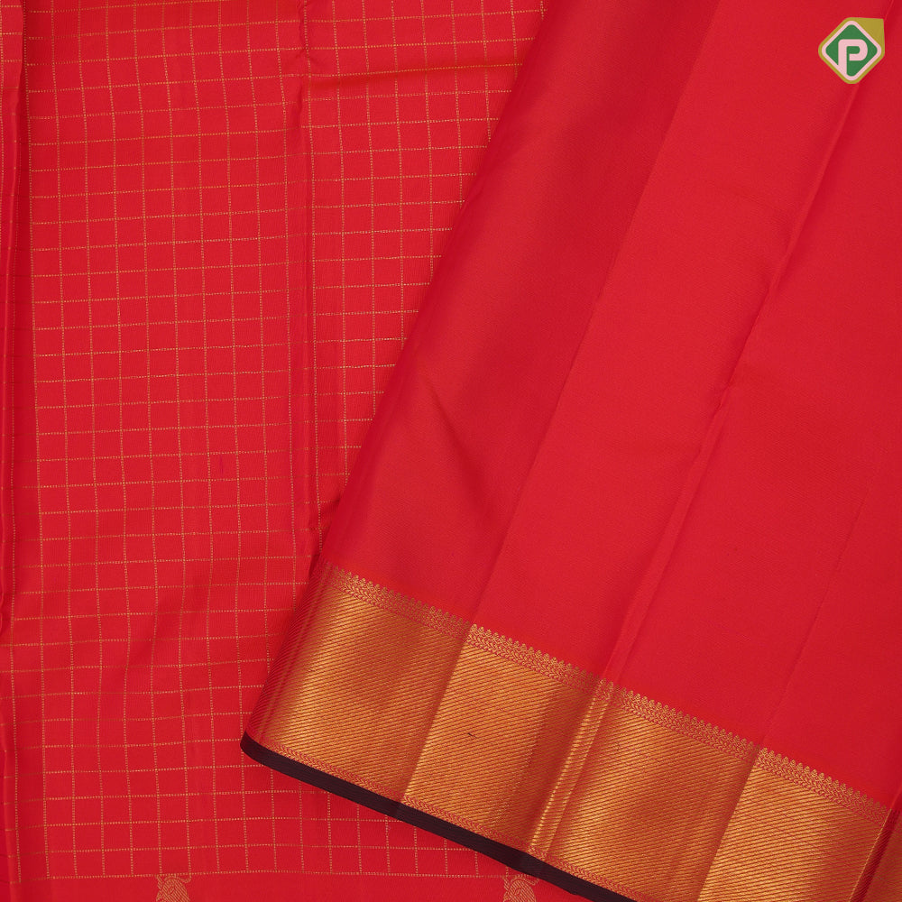 Flame red gold zari kattam checks design parrot butta padded self gold zari bavanji edge border traditional silk saree