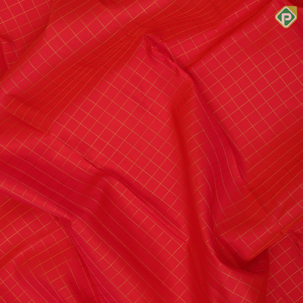 Flame red gold zari kattam checks design parrot butta padded self gold zari bavanji edge border traditional silk saree