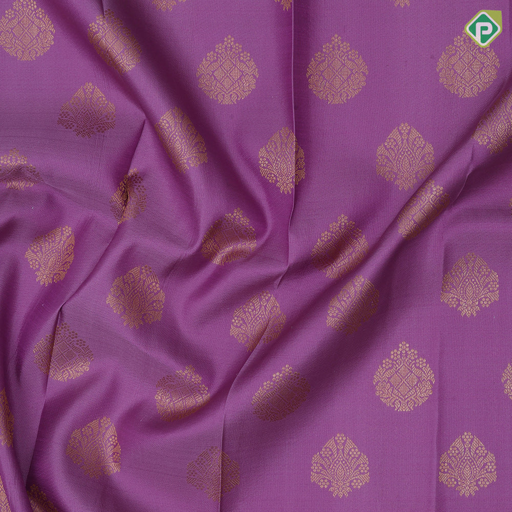 Lavender gold zari thilagam butta design rama green gold zari zig zag border traditional silk saree
