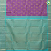 Lavender gold zari thilagam butta design rama green gold zari zig zag border traditional silk saree