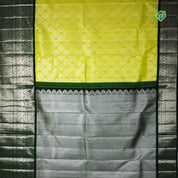 Lemon Green Silver Zari Yaali Motifs Lines Border Pure Traditional Silk Saree
