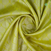 Lemon Green Silver Zari Yaali Motifs Lines Border Pure Traditional Silk Saree
