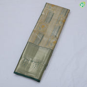green base pastel red frame flower design self color gold zari grand border tissue art silk saree