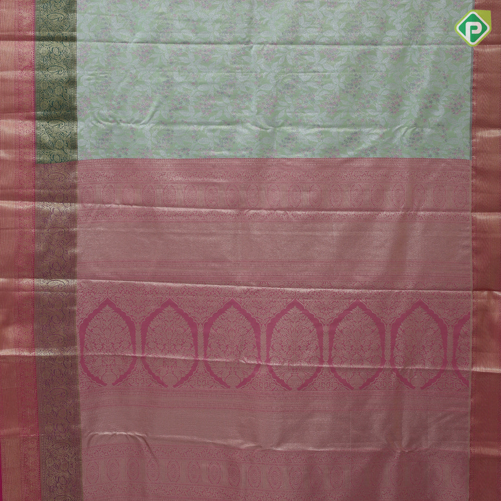 Pista green silver zari and multi color floral design contrast double color center border tissue art silk saree