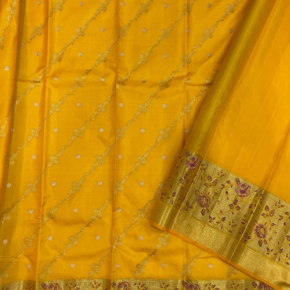 Orangish Yellow Silk Thread Pythonic Design Border Exclusive Grand Silk Saree