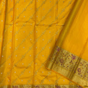Orangish Yellow Silk Thread Pythonic Design Border Exclusive Grand Silk Saree
