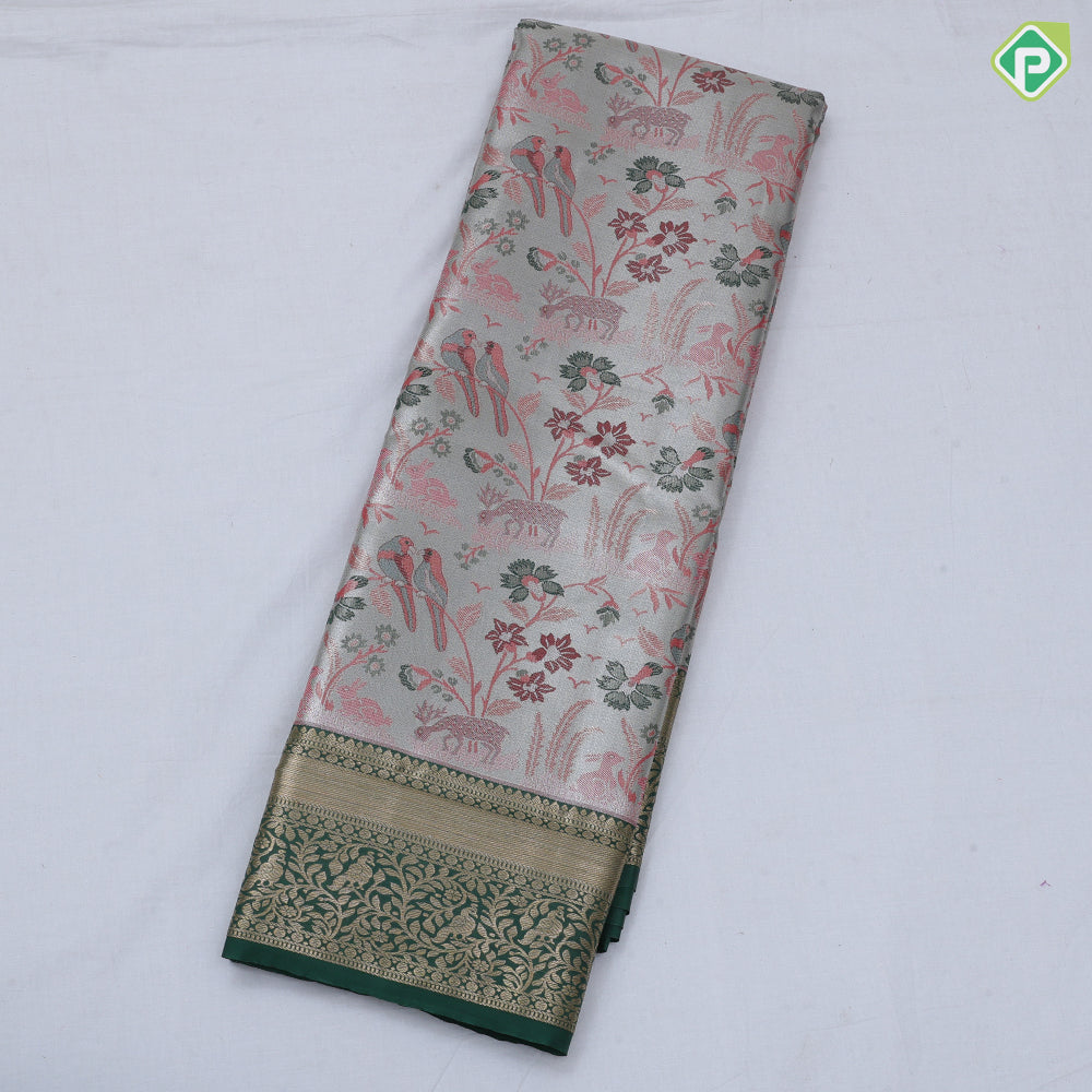 Pewter pink base multi color wild effect design dark green gold zari floral birds design border tissue art silk saree