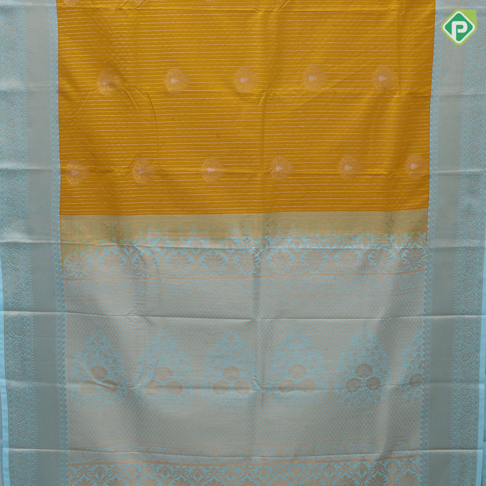 Mustard yellow gold zari stripes big thilagam butta pista green gold zari rangoli design border art silk saree