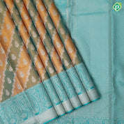 Golden yellow base silver gold zari grand floral creeper design sea green silver gold zari mango border Rangkat silk saree