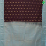Chocolate brown gold zari peacock chakkaram butta stripes sky blue gold zari mango butta border art silk saree