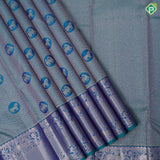 Peacock green silver gold zari honey comp weave self silver gold zari yaali rettapet border traditional silk saree